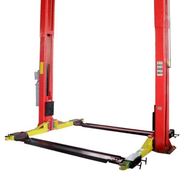 An AMGO 20805 Golf Lift Accessory Kit installed on a red and yellow two-post lift, with the black bridgelike platforms providing a secure surface for a vehicle.