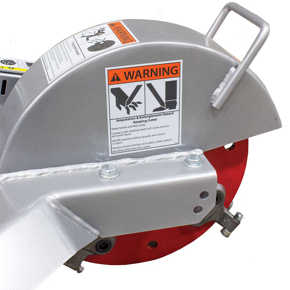 A close-up of the red cutting wheel and gray protective guard of the Dosko 337-13HC Stump Grinder, highlighting the Greenteeth and "WARNING" label.