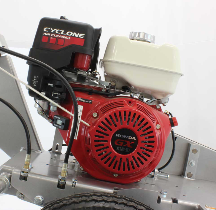 A close-up of the red Honda GX engine and "CYCLONE CLEANER" on the Dosko 337S-13HC swivel stump grinder.