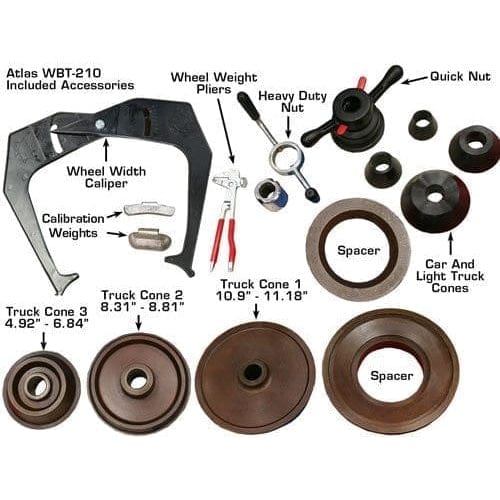 A close-up of the Atlas WBT-210's accessories, including wheel weight pliers, measuring calipers, and a hub-centric ring.