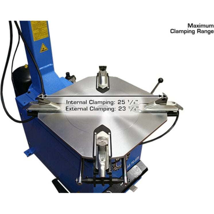 A close-up view of the turntable on the Atlas TC229LH Rim Clamp Tire Changer, showing the maximum clamping range with the jaws set for internal clamping at 25 1/4" and external clamping at 23 1/4".