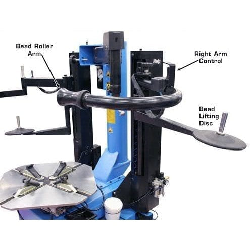 A close-up view of the Atlas® TC289DAA tire changer's right-hand control arm, bead roller arm, and bead lifting disc.