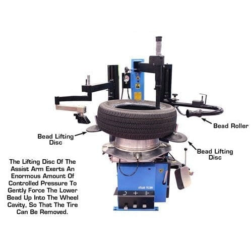The Atlas® TC289DAA tire changer with a tire mounted, showing the bead roller and bead lifting disc.