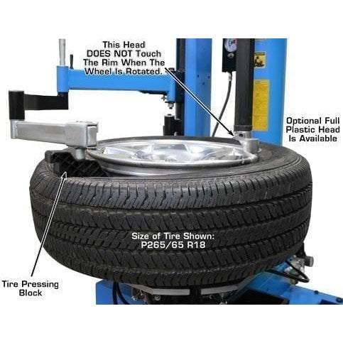 The Atlas TC289LH tire changer with a tire mounted on the machine, demonstrating the tire pressing block and mount/demount head which doesn't touch the rim, with an optional full plastic head available.
