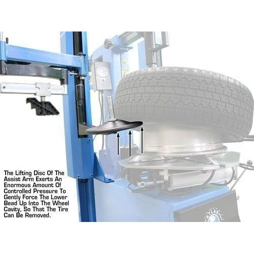 A closeup view of a tire being removed by the Atlas TC289LH, showing the bead lifting disc of the assist arm lifting the tire's lower bead.