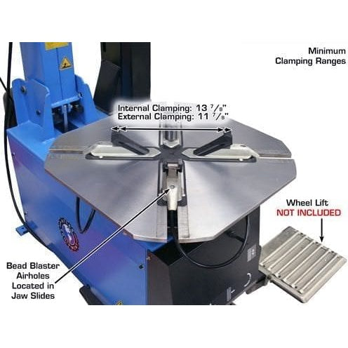A close-up, overhead view of the Atlas TC755EZ's turntable, showing the multiple jaw mounting positions that allow for different clamping ranges.