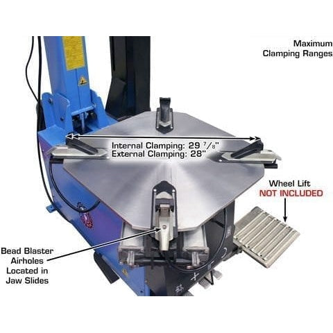 A top-down view of the Atlas TC755EZ's turntable, showing the maximum clamping ranges with internal clamping at 28 inches and external clamping at 26 inches. The bead blaster airholes are located in the jaw slides.