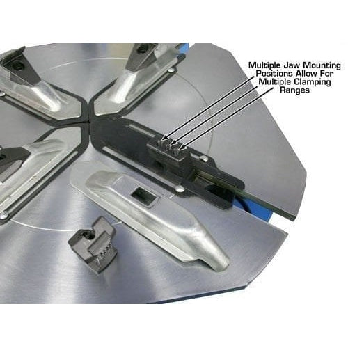 A top-down view of the Atlas TC755EZ's turntable, showing the minimum clamping ranges with internal clamping at 13 inches and external clamping at 11 inches. The bead blaster airholes are located in the jaw slides.