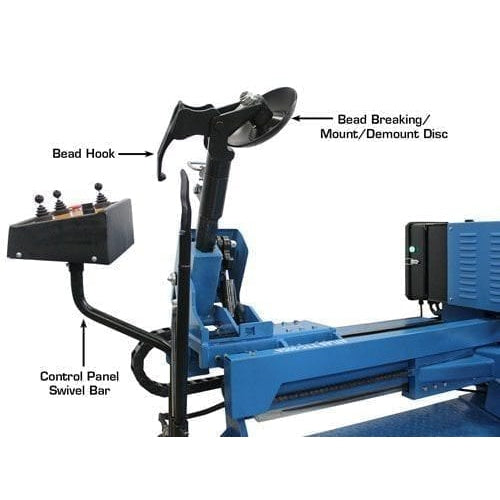 A side view of the Atlas TTC305A truck tire changer, showing the bead breaking/mount/demount disc, bead hook, and the control panel swivel bar.