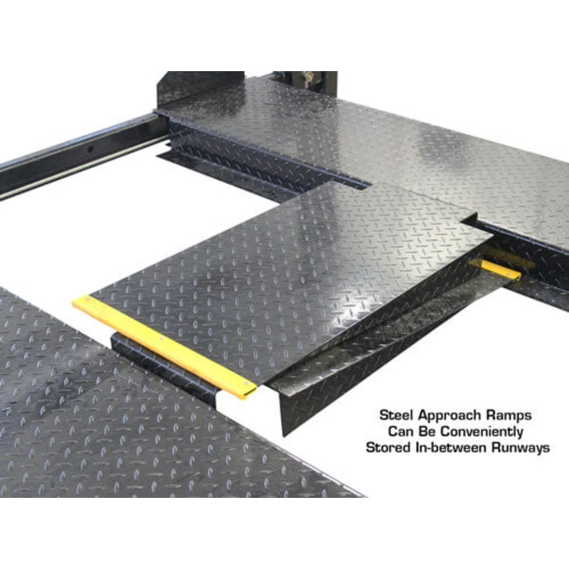 The steel approach ramps for the Atlas Garage PRO8000 are shown stored conveniently in between the runways.