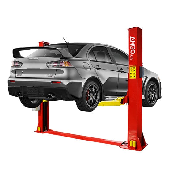 A silver sedan is shown elevated on a red and yellow AMGO BP-9 Two-Post Base Plate Lift, showcasing its 9,000 lbs lifting capacity and how it raises a vehicle in a garage.