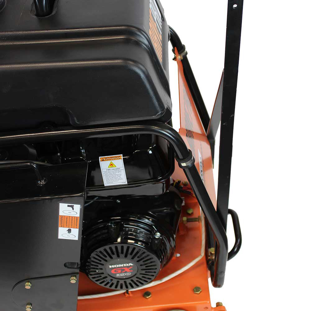 A close-up view of the Brave Pro 20-inch concrete floor saw's Honda GX390 engine, showing the engine model and safety warnings.