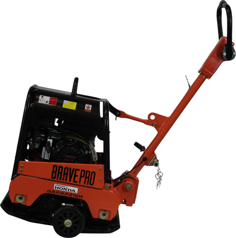 Three-quarter view of the Brave 15-Inch Reversible Plate Compactor, showcasing the black handle, orange base, and Honda engine on a checkered background.