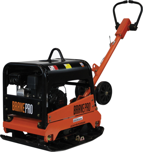 Three-quarter view of the Brave 20-Inch Reversible Plate Compactor, showing its black and orange body, ergonomic handle, and the black plate base designed for soil compaction.