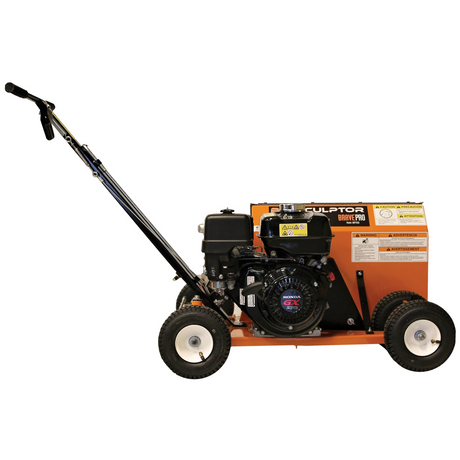 Side view of the Brave 9-in. Steerable Trencher/Bed Sculptor, highlighting its compact size, with the engine and wheels visible, designed for landscaping tasks.