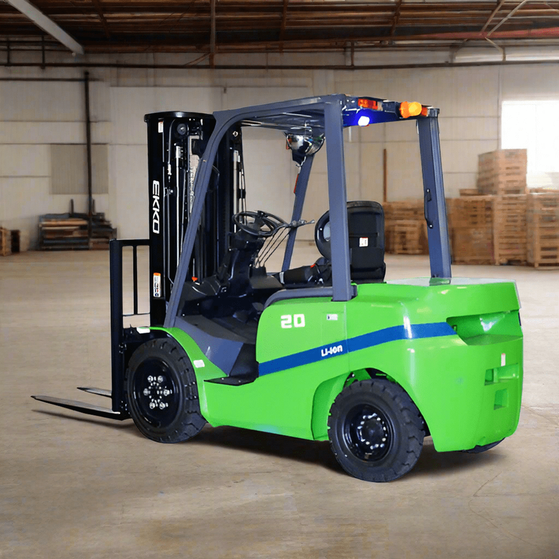 A green EKKO EK20GT-LI Electric-Forklift with solid pneumatic tires in a warehouse setting with stacks of boxed products in the background.