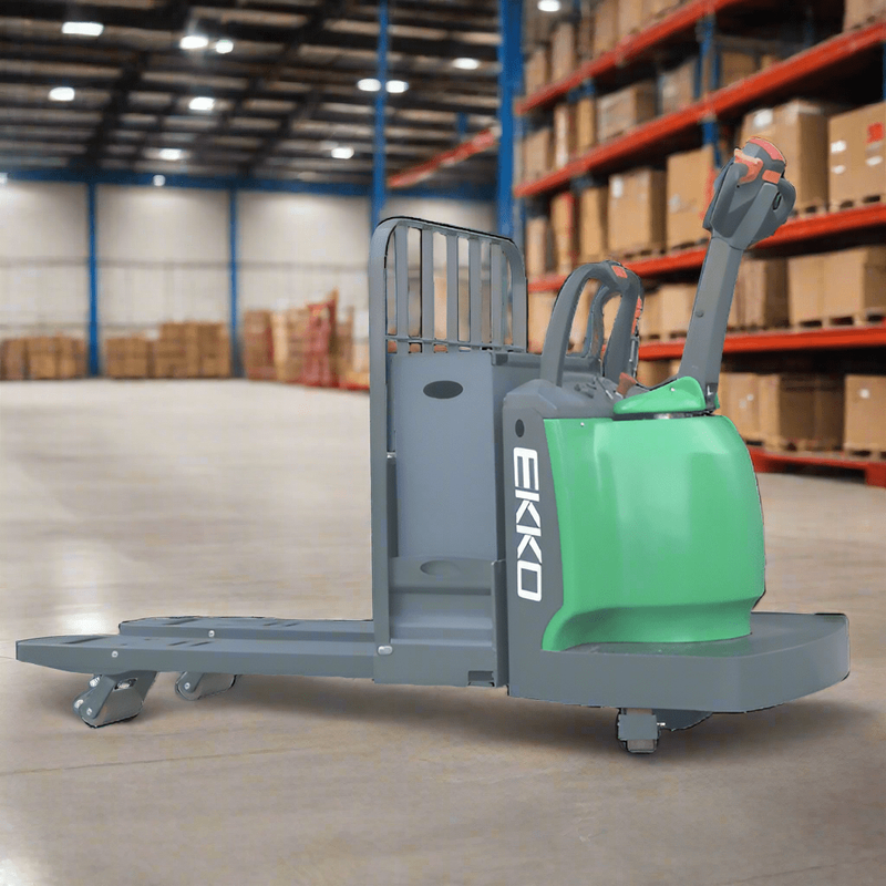An EKKO EP30A-Li Lithium Walkie Rider Pallet Jack with a 6600-pound load capacity is angled on a warehouse floor with tall racks and boxes in the background.
