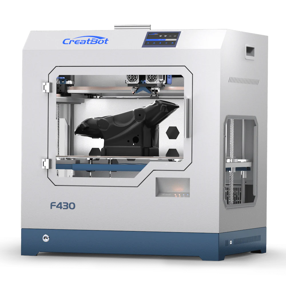 A front-facing three-quarter angle shot of the CreatBot F430 3D printer, highlighting the printer's side panel and the internal gantry system with a large, black object on the print bed.
