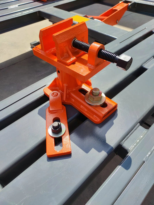 A detailed close-up of a quick-fix clamp jaw from the Katool KT-198L frame machine, showing its robust orange and black metal construction, designed for securing the vehicle chassis.