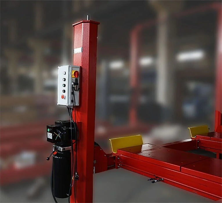 A red and yellow Katool KT-4H150 4-post lift in a garage, showcasing the hydraulic pump and control panel attached to the front post.