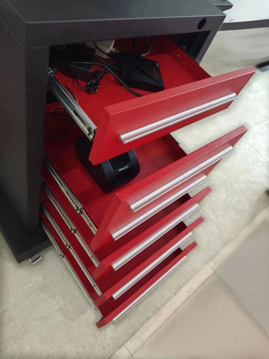 A side view of the open red drawers of the Katool KT-AV651 3D wheel aligner's cabinet, showing storage for tools and accessories.