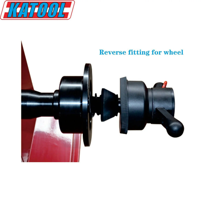 A close-up of a reverse fitting tool for a wheel, displaying black metal components aligned for assembly, with the KATOOL logo and the text Reverse fitting for wheel at the top.