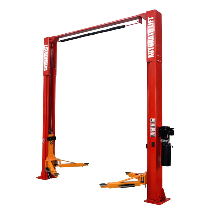 A full view of the red Katool KT-M120 2-Post Car Lift with yellow lifting arms, shown against a white background, displaying its symmetrical design and overhead safety shutoff bar.