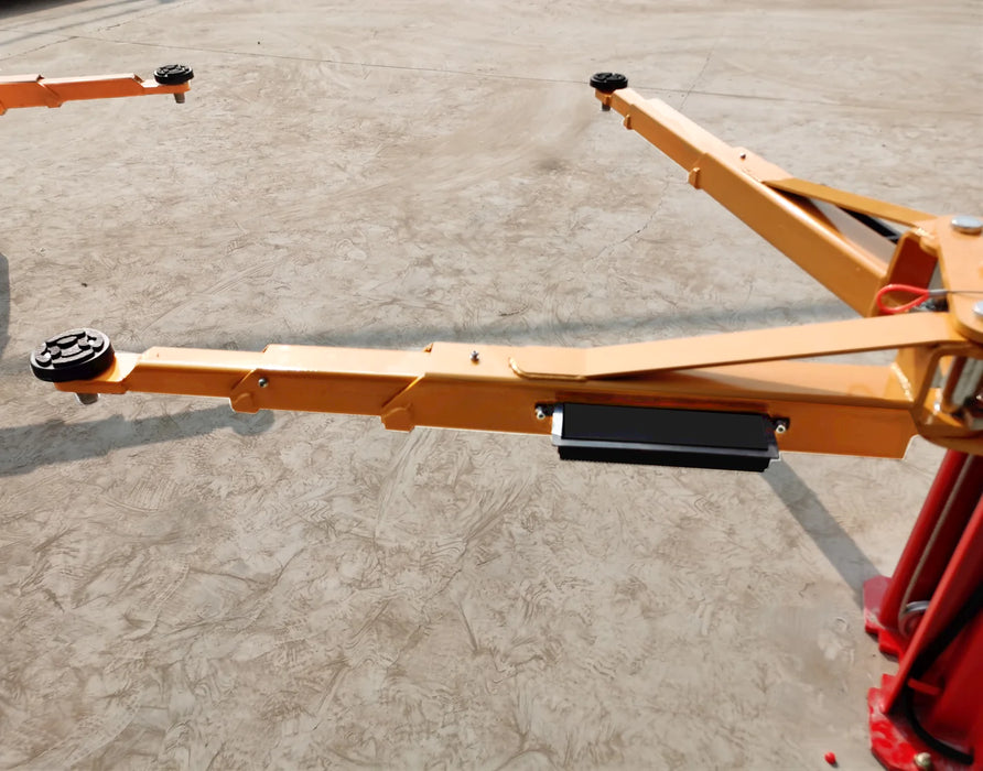 A close-up of the yellow lifting arm on the Katool KT-M120, showing the adjustable pad with a black rubber pad for protecting vehicle doors and the extension mechanism.