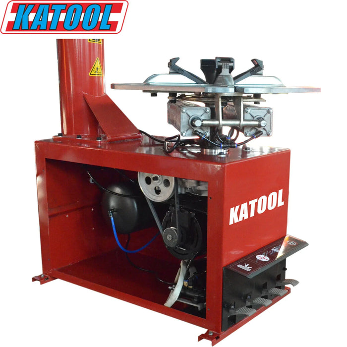 A rear perspective of the redKatool Wheel Clamp Tire Changer Machine KT-T800, exposing the internal air cylinder, motor, and pulley system that powers the machine