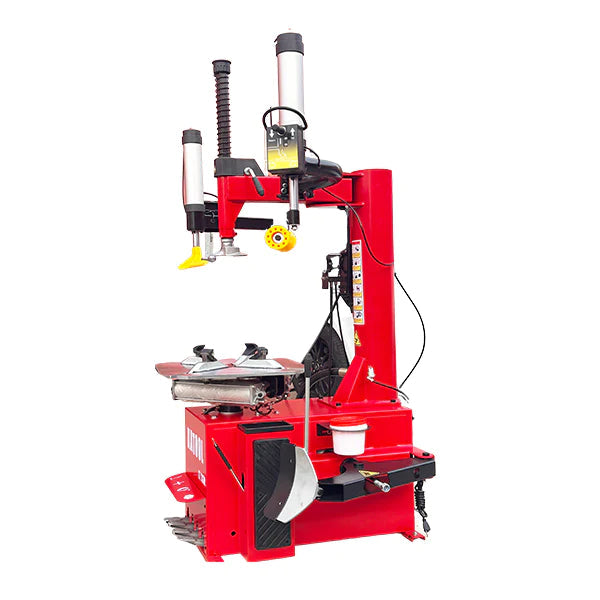 A front, angled view of the red and black Katool KT-T830 tire changer, showing its main body, tire bead breaker, and a prominent assist arm.
