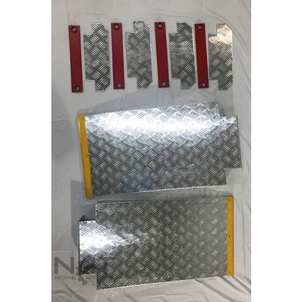 A view of the detachable aluminum ramps, rolling jack tray, and caster brackets for the Triumph NOS9000 four-post lift.