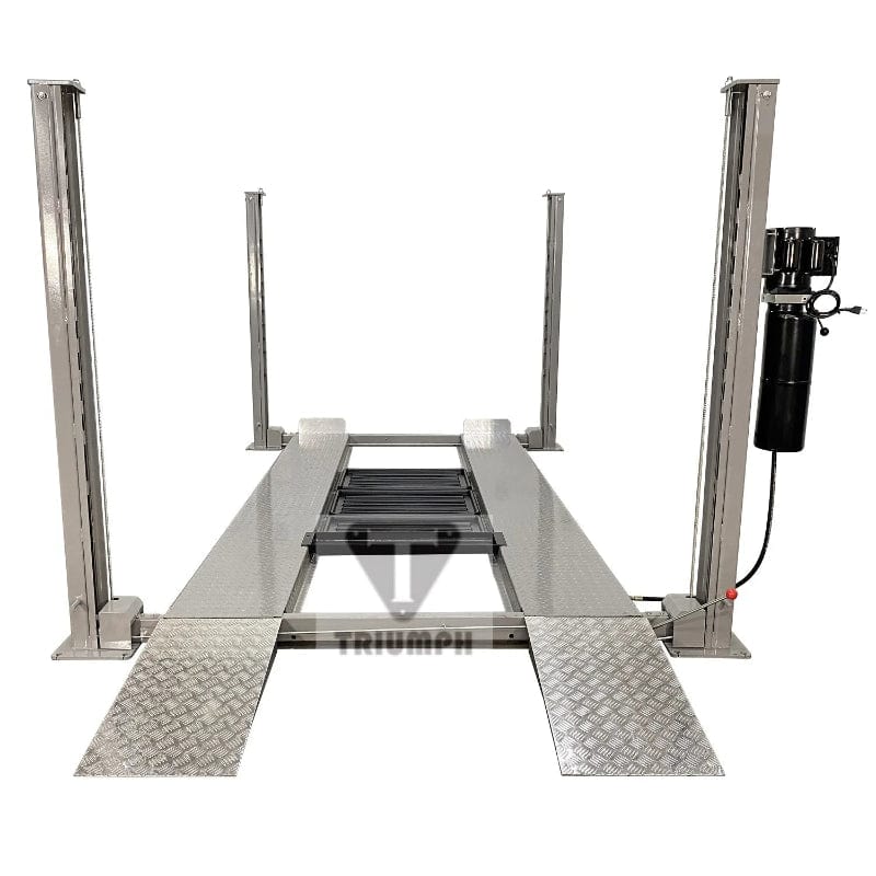 The Triumph NSS-8Classic, a four-post lift with extended ramps, is shown with a light gray powder-coated finish. This lift has an 8,000 lb lifting capacity and a single-point lock release system.
