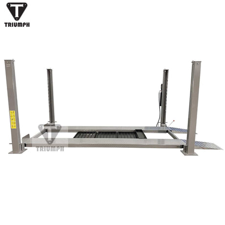 The Triumph NSS-8Classic 4-post lift has an 8,000 lb lifting capacity. It is shown with a light gray powder-coated finish and is an ideal solution for car storage or service.