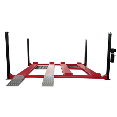 A detailed view of the hydraulic cylinder on the front left post of the black and red Triumph NSS9000 4-Post Lift, showing the cylinder, a black hose, and the steel post.