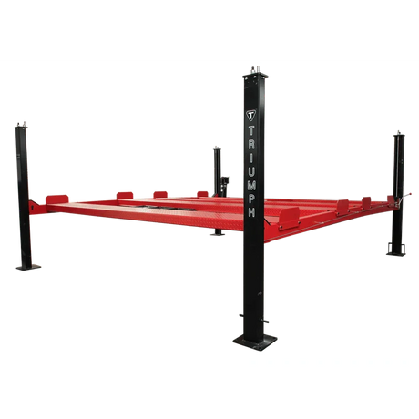 A side view of a black Triumph NSS9000 9,000 lb Double Service Storage 4-Post Lift with a classic car raised to a mid-height position, showcasing the red ramps. Another car is parked on the ground underneath.