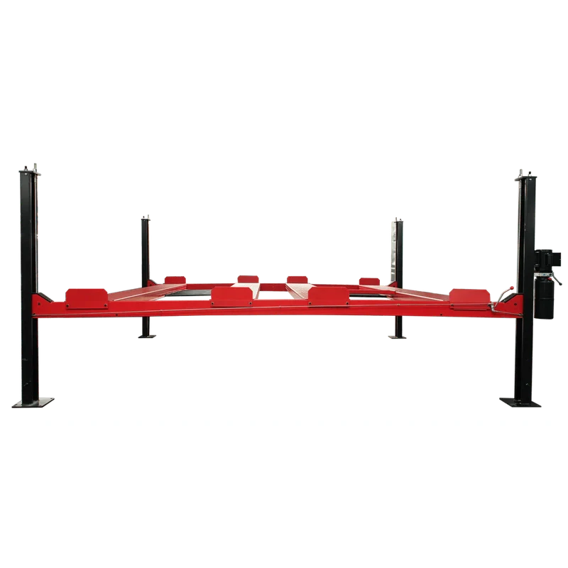 A close-up view of the caster wheels on the red frame of the NSS9000 lift, showing the wheels and the pin used to secure them to the lift post.