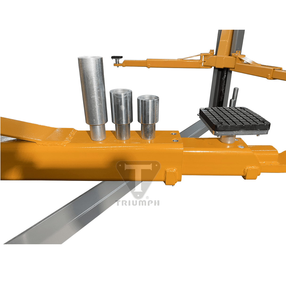 A close-up view of the yellow lifting arm with adjustable adapters and pads on the Triumph NT-11 two-post lift.