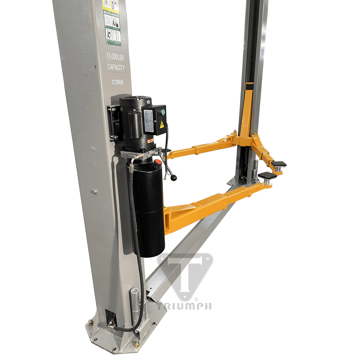 A close-up side view of the gray post with the black power unit and hydraulic fluid tank of the Triumph NT-11 two-post auto lift.