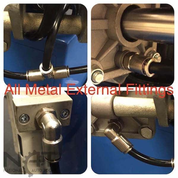 Close-up view of the all-metal external fittings on the Triumph NTC-950 tire changer.