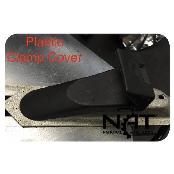 Close-up of the plastic clamp cover on the Triumph NTC-950, designed to protect wheels during service.