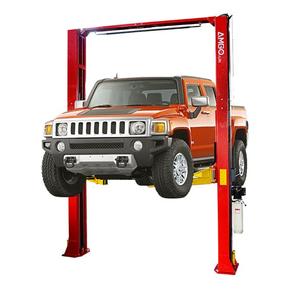 An AMGO OH-15 Two-Post Lift in red, with a yellow overhead beam, elevating an orange Hummer H3 SUV against a white background.