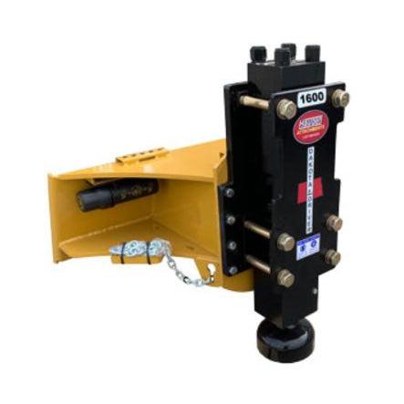 A detailed view of the black and yellow skid-steer post driver attachment, featuring a '1600' model number sticker, the heavy-duty mounting plate, and the hammer head.