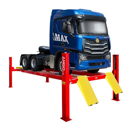 An AMGO PRO-18 Heavy Duty 4-Post Lift in red with yellow ramps, elevating a blue semi-truck against a transparent background.