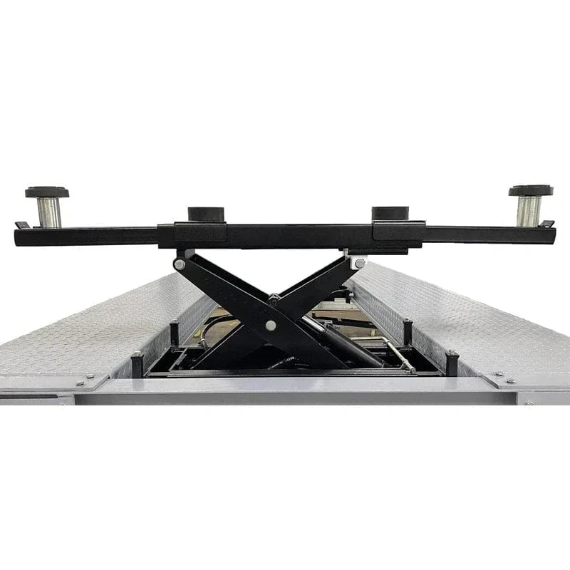 The Triumph RJ-5000, a black rolling bridge jack with a scissor lift-style mechanism, is shown with a 5,000 lb capacity. The jack's frame is shown with a minimum width between pads of 32.2 inches.