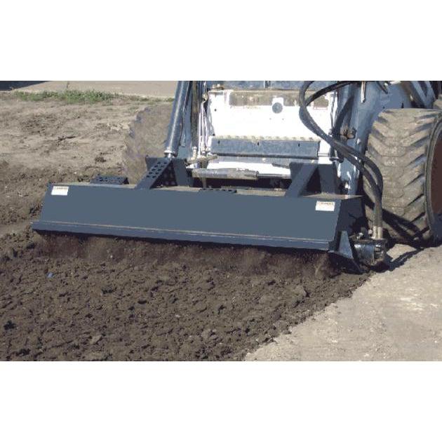 A skid-steer rotary tiller in use, attached to a skid-steer loader and tilling soil, demonstrating its function and an adjustable depth of 0 to 6 inches.