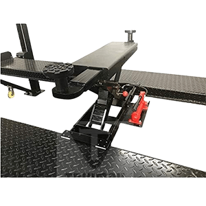 A close-up view of the black and red SJ35 hydraulic sliding jack on the runway of a car lift, highlighting its compact design.