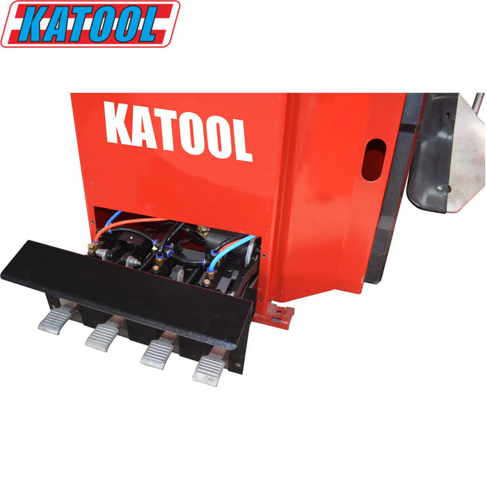 A red KATOOL machine with four metal foot pedals and visible internal wiring, featuring the KATOOL logo at the top and KATOOL printed in white on the machines side.
