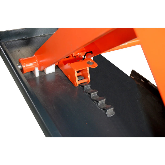A detailed, close-up view of the pneumatic safety lock and gear mechanism on the X80-PNEUMATIC scissor lift. The image showcases the durable construction of the safety release system.