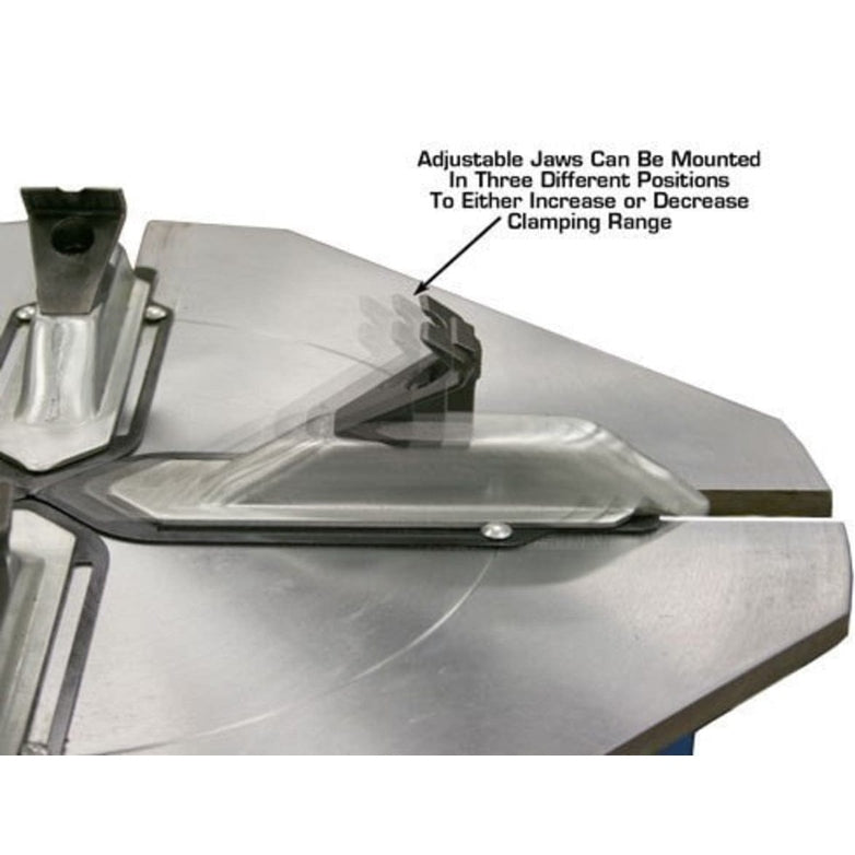 A close-up of the clamping jaws on the Atlas® TC755 tire changer, with overlay text explaining that the adjustable jaws can be mounted in three different positions to increase or decrease the clamping range.