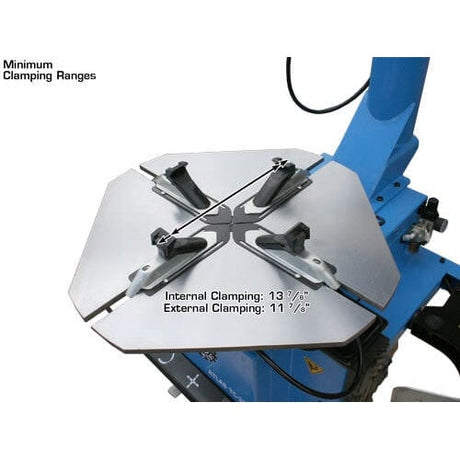 A close-up view of the turntable on the Atlas TC289DAA tire changer, showing the minimum clamping range with internal clamping at 13 7/8 inches and external clamping at 11 7/8 inches.